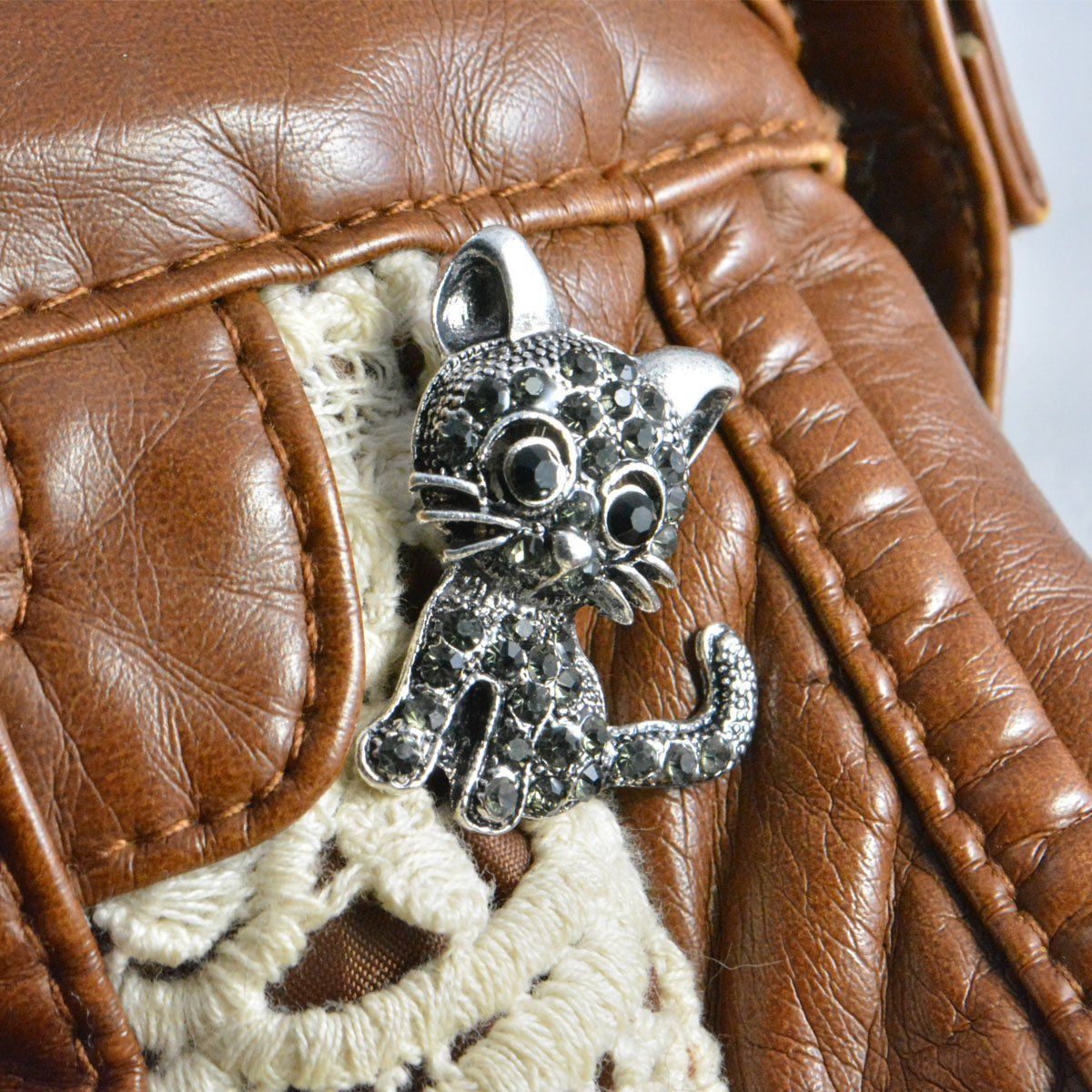 crystal cat pin on purse