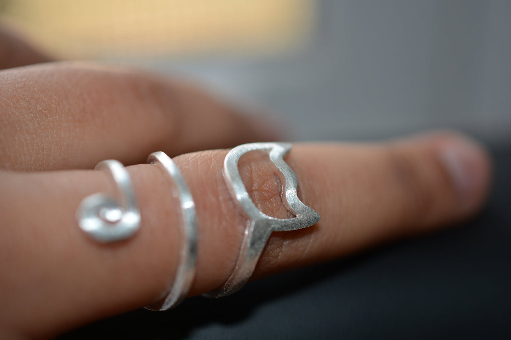 Sterling Silver Spiral Cat Ring from Catify.co worn on finger