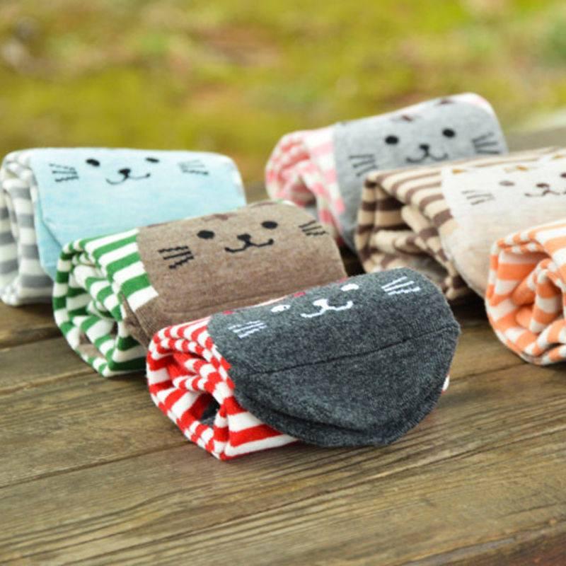 Striped Fat Cat Socks rolled on table