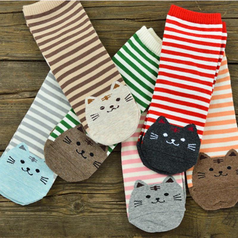 All Variations of Striped Socks laid out on table