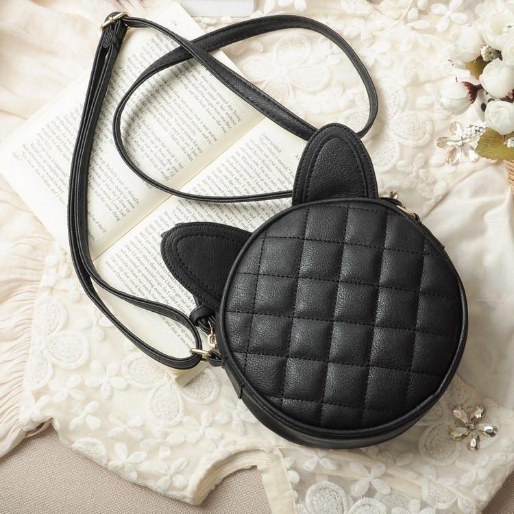 Cat Ear Messenger Bag on Couch 